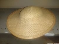 Top view of woven wicker safari hat