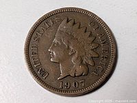 Obverse of 1907 Indian Head cent showing date and legend