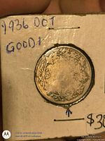 Reverse of 1936 dot 25-cent coin in 2×2 flip, date and dot visible