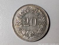 Reverse of 20 Rappen coin showing denomination and wreath