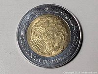 Obverse with Mexican coat of arms eagle and outer wreath