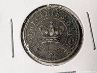 Obverse of apothecary weight showing crown, legend and numeral 3