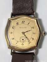 Front view of Bulova watch showing dial and case