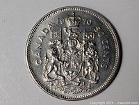 Reverse showing CANADA 1970 50 CENTS with full coat of arms