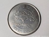 Obverse showing Broncos logo and text