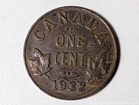 Reverse of 1932 Canada one cent coin showing maple leaves and date