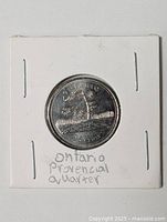 Front view of Ontario provincial quarter in holder
