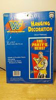 Front of sealed package showing WWF logo and hanging decoration text