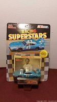 Front view of sealed Racing Champions Racing Superstars #43 car on card