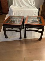 Both end tables side by side on floor mat