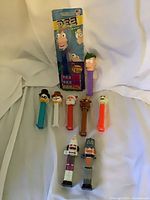 All nine dispensers including one sealed and eight loose