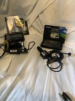 Both GPS units with accessories and manuals