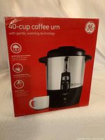 Sealed retail box front showing GE 40-cup coffee urn image and specs