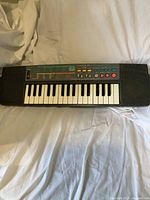 Full top view of keyboard showing keys and speakers