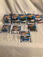 Nine carded Hot Wheels Tokyo 2020 cars overview