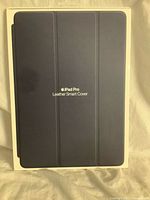 Front of boxed Apple iPad Pro Leather Smart Cover