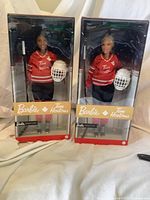 Front view of both boxed Barbie Tim Hortons dolls