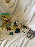 Group shot of all items displayed on cloth backdrop