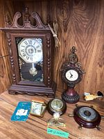 Group shot of all clocks and barometer