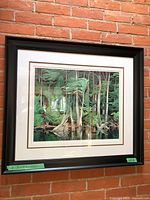 Full view of framed print on wall