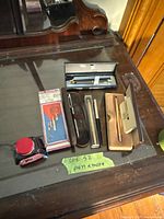 Overview of all pens, cases, cartridge pack on tabletop