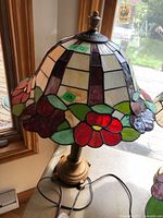 Full view of lamp with stained glass shade and base