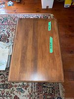 Top view of wooden tea cart showing rectangular surface and grain