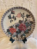 front view of plate showing floral design and border