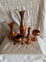 Group shot showing all six copper pieces