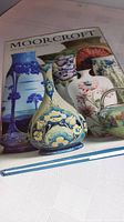 Front cover showing Moorcroft reference book