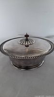 Entire lidded silver-plated serving bowl