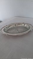 Top view of silver-plated dish with glass liner in place