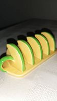 Top angle of yellow and green Carlton Ware toast rack