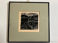 Full framed etching with mat and frame visible