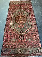 Full view of rug showing design and overall condition