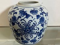 Full view of blue and white porcelain vase showing decoration and form