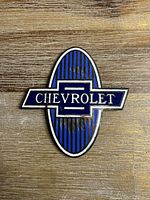 Front view of Chevrolet enamel badge