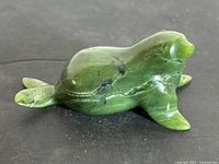 left side view of green nephrite jade seal sculpture