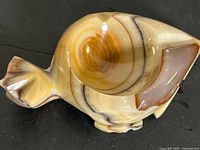 Top view of onyx turtle dish showing recessed bowl and stone banding
