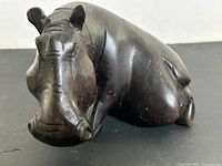 Front angled view of ebony hippo figurine