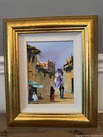 Framed oil painting front view