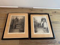 Both framed etchings side by side