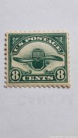 Front view of 8-cent dark green Radiator and Propeller airmail stamp