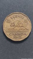 Reverse of 1942 Canada 5-cent coin showing beaver design and date