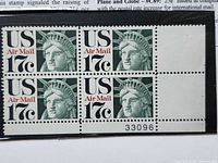 Full view of the block of four 17¢ Statue of Liberty airmail stamps showing plate number 33096