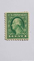 Front view of green George Washington 1¢ stamp