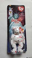 Front view of sealed Ty Glory bear on blister card
