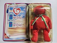 Front view showing Osito bear in blister and The End booklet inside