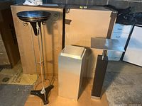 Three stands grouped together showing relative sizes and finishes