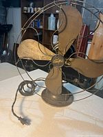 Full view of Star-Rite fan showing blades, cage, base